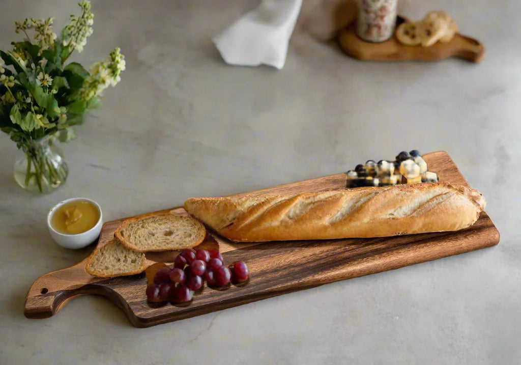 Long Acacia Charcuterie Board — 23 × 7 in.